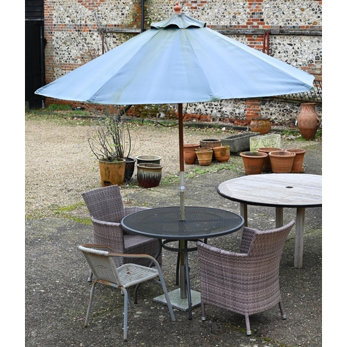 26 - A pair synthetic rattan all-weather garden chairs to/with a circular metal table, parasol and anothe... 