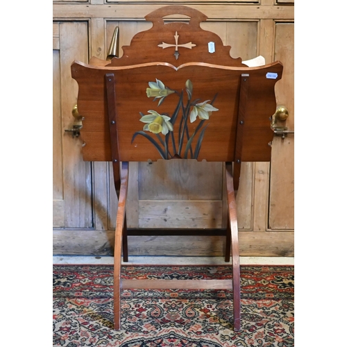 41 - A polychrome floral decorated folding newstand