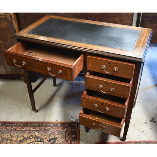 47 - A late 19th/20th century cross-banded satin walnut desk, the leather inset top over a kneehole drawe... 