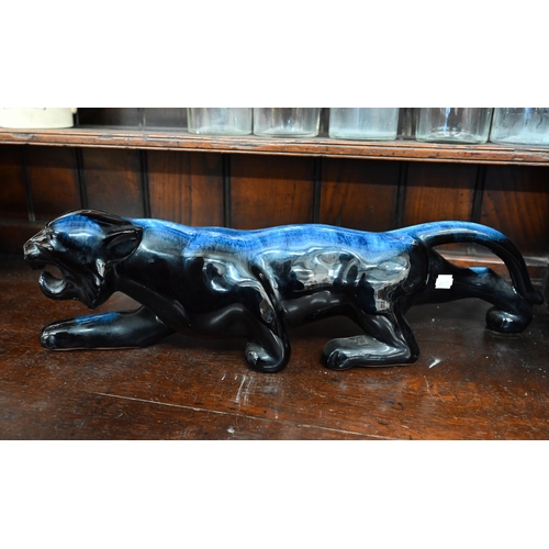 75 - Blue-glazed earthenware panther, 53 cm long