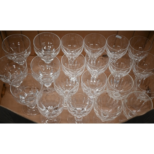 83 - Set of sixteen blown and cut wine glasses, on waisted stems to/w five somewhat similar large serving... 