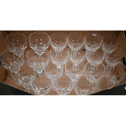 83 - Set of sixteen blown and cut wine glasses, on waisted stems to/w five somewhat similar large serving... 