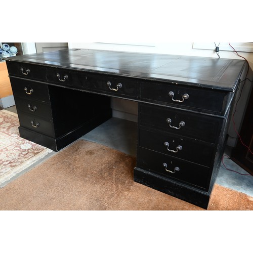 556 - A large ebonised twin pedestal desk with black leather top over nine drawers, 184 cm wide x 90 cm de... 