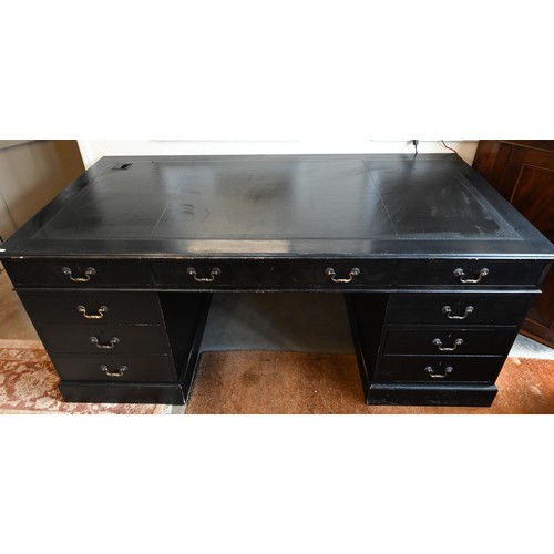 556 - A large ebonised twin pedestal desk with black leather top over nine drawers, 184 cm wide x 90 cm de... 