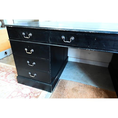 556 - A large ebonised twin pedestal desk with black leather top over nine drawers, 184 cm wide x 90 cm de... 