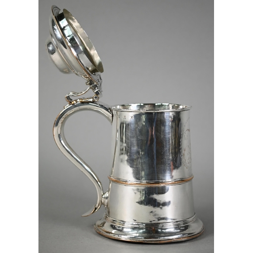 11 - Georgian Sheffield plate tankard, the domed cover with foliate scroll thumb-piece, the scroll handle... 