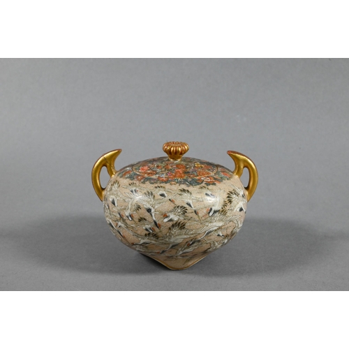505 - A small Satsuma twin-handled koro and cover with chrysanthemum finial,  gilded and finely painted in... 