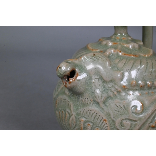 513 - A Chinese Yaozhou celadon cadogan teapot or wine pot in the Northern Song dynasty style, with moulde... 