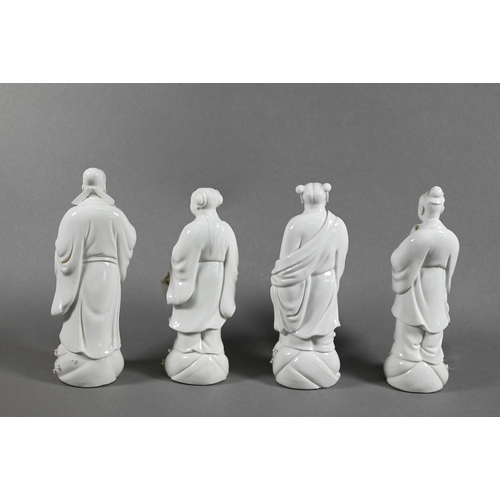 509 - Four late 19th or early 20th century Chinese blanc-de-chine dehua porcelain figures of Daoist immort... 