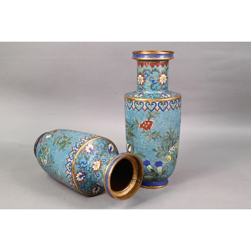511 - A pair of 19th century Chinese cloisonne on brass rouleau vases decorated in polychrome enamels with... 