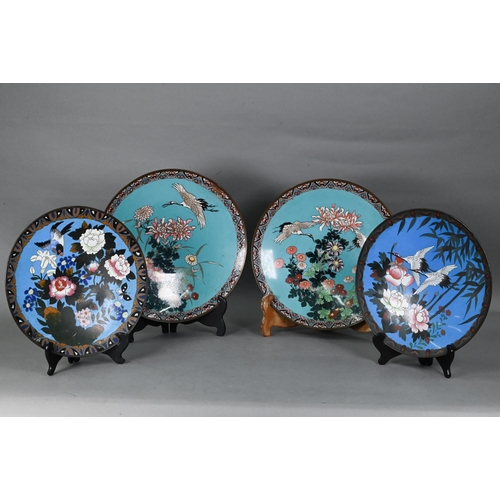 524 - A pair of 19th century Japanese cloisonne chargers, decorated in polychrome enamels with red red-cro... 