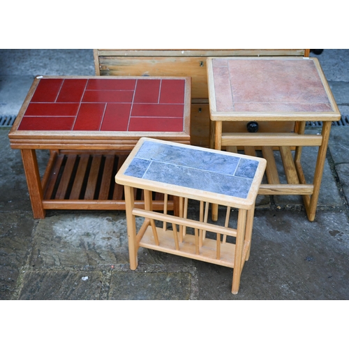 44 - Vintage teak coffee table with inset red tiled top and slatted undertier, 65 cm wide x 44 cm deep x ... 