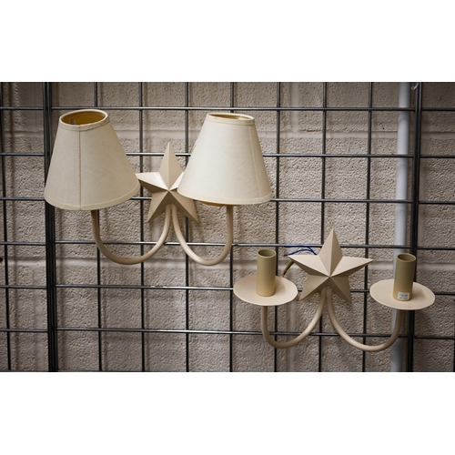 475 - # Five cream-painted metal twin-sconce wall lights with star motif