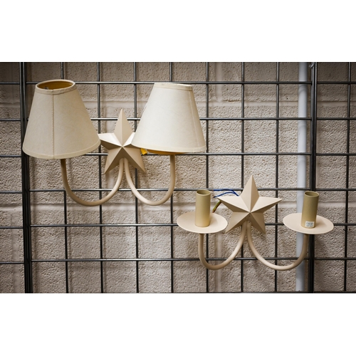 475 - # Five cream-painted metal twin-sconce wall lights with star motif