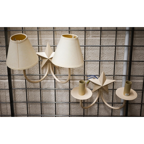 475 - # Five cream-painted metal twin-sconce wall lights with star motif