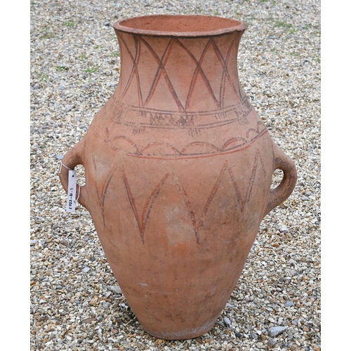 252 - A large terracotta two handled classical urn, 72 cm high