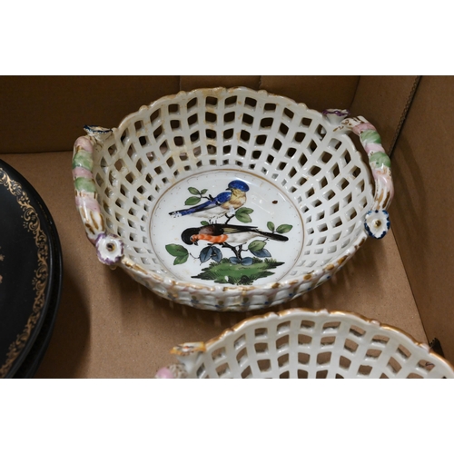 106 - Pair of 19th century ornithological Meissen baskets, painted with birds, 15 cm diam (restored and re... 