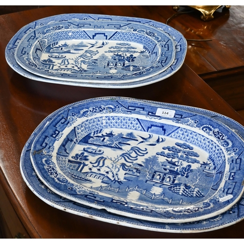 114 - Four early 19th century Ironstone Willow pattern meat dishes, 45/40 cm wide (one smaller dish repair... 