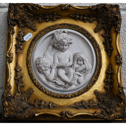 121 - Two gilt-framed reconstituted marble circular relief plaques depicting courting couple and playful p... 