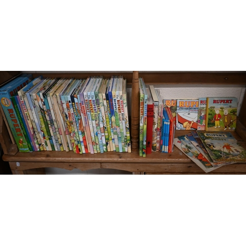 124 - Thirty-four Rupert Bear annuals, mostly 1980s/90s, to/w two facsimile annuals, and related publicati... 