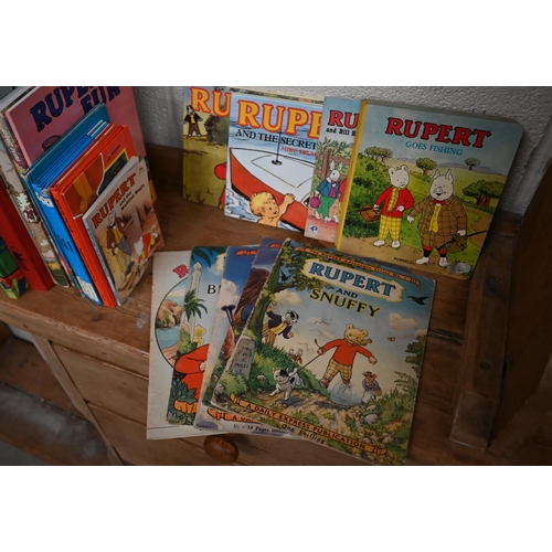 124 - Thirty-four Rupert Bear annuals, mostly 1980s/90s, to/w two facsimile annuals, and related publicati... 