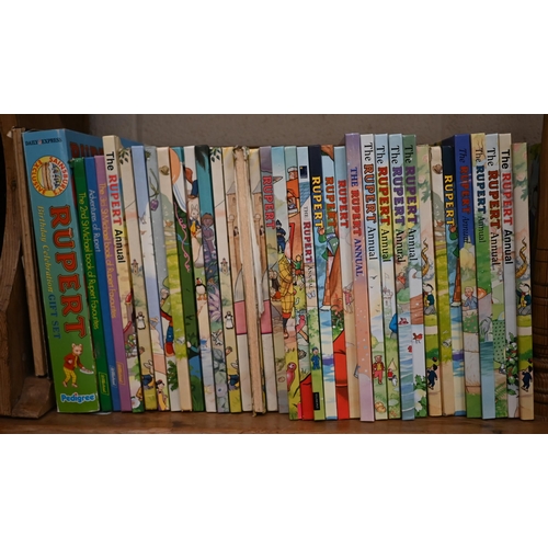 124 - Thirty-four Rupert Bear annuals, mostly 1980s/90s, to/w two facsimile annuals, and related publicati... 