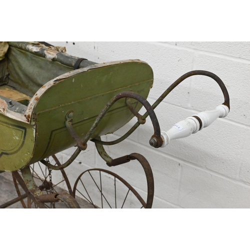 157 - # An antique baby's pram with painted body, china handle and wrought iron frame