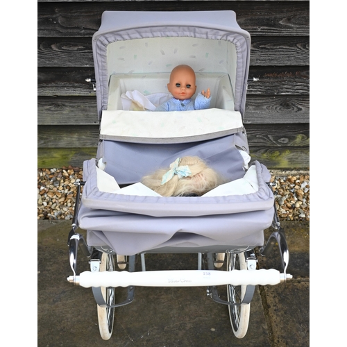 158 - Silver Cross baby's pram in grey livery c/w two dolls