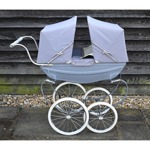 158 - Silver Cross baby's pram in grey livery c/w two dolls