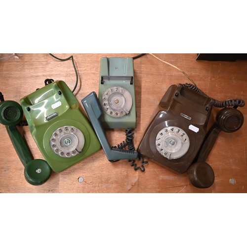 165 - 1970s 'Trimphone' and two BT dial telephones, in green and brown (3 - a/f)