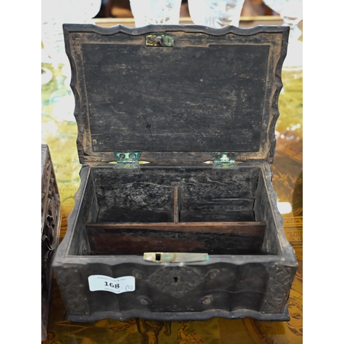 168 - Antique Indian carved ebony casket with silver mounts, 21 cm wide to/w a foliate carved teak box (2)