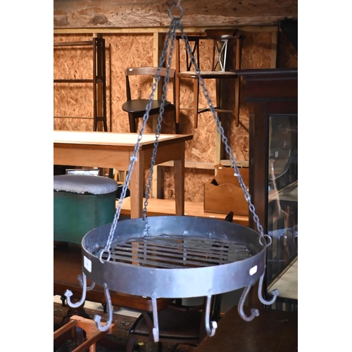 19 - A rivetted forged steel circular hanging kitchen utensil rack