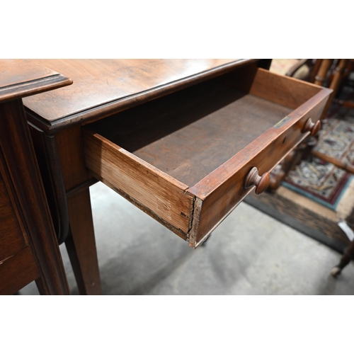 251 - A 19th century mahogany Pembroke table with end drawer and opposing dummy drawer raised on square le... 