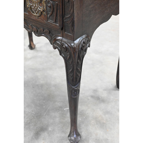 254 - An antique carved oak lowboy with three drawers, 78 cm x 52 cm x 72 cm high