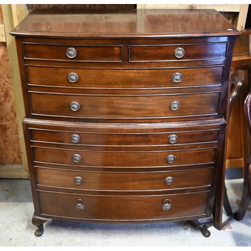 29 - A Victorian style mahogany chest on chest composed of two short over five long graduated drawers, on... 