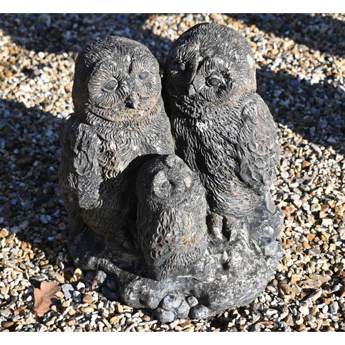 3 - A weathered pair of miniature cast stone toadstools to/w a cast trio of stone owls (3)