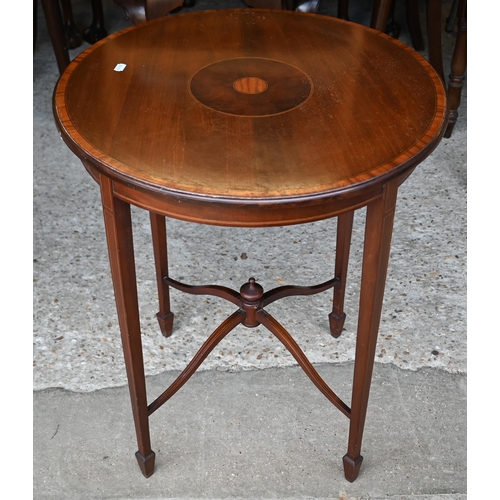 31 - An inlaid Victorian mahogany oval two-tier occasional table to/w a similar circular table (2)
