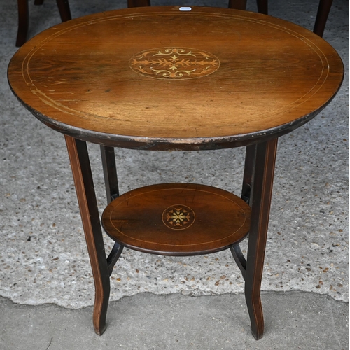 31 - An inlaid Victorian mahogany oval two-tier occasional table to/w a similar circular table (2)