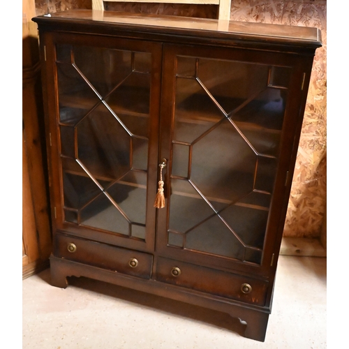 35 - A Victorian style low mahogany astragal glazed bookcase, two drawers below on shaped bracket feet
