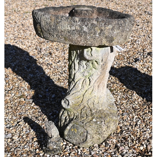 4 - Two weathered cast stone garden statues to/w a stone cast birdbath (3)