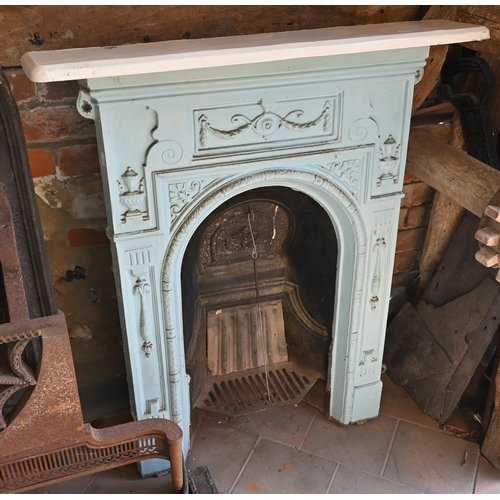 432 - A Victorian cast iron bedroom fireplace, 62 cm wide x 97 cm (with shelf 82 cm wide o/a)