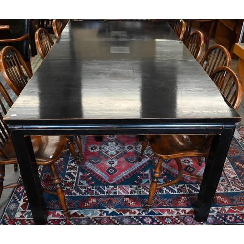 435 - A Lombok Chinese-style black lacquered extending dining table with single central leaf, the top inse... 