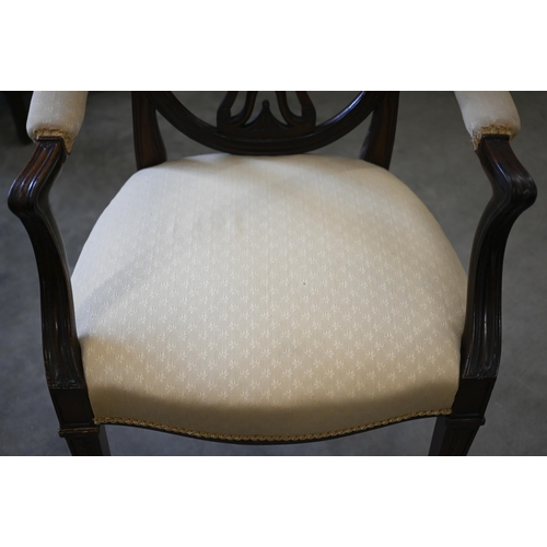 449 - A mahogany Hepplewhite style shield back elbow chair with foliate yellow upholstery