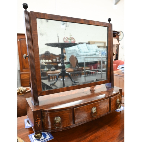 455 - A 19th century mahogany framed toilet mirror on three drawer platform base with lion mask brass hand... 