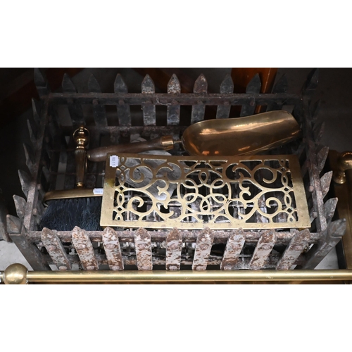 459 - A cast iron fire-back with relief equestrian group, 72 x 56 cm to/w an iron fire-basket, brass rail ... 