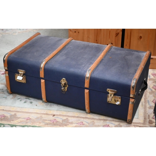 463 - A school pattern blue travelling trunk with wooden runners