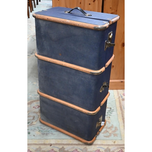 463 - A school pattern blue travelling trunk with wooden runners