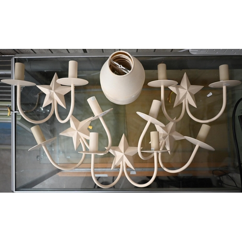 475 - # Five cream-painted metal twin-sconce wall lights with star motif