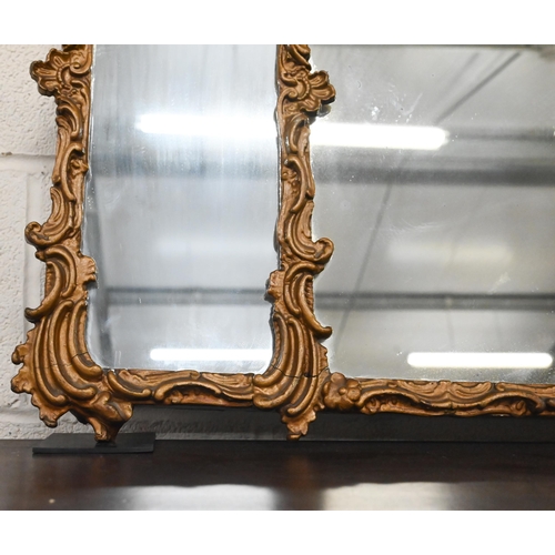 484 - A triple plate wall mirror with giltwood and gesso floral moulded frame, 112 cm wide x 64 cm high