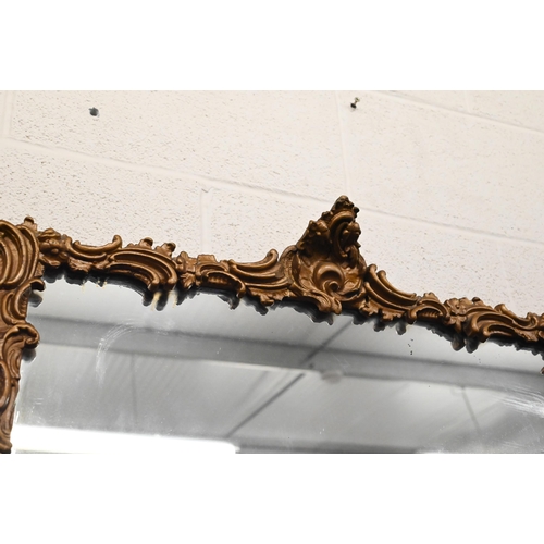 484 - A triple plate wall mirror with giltwood and gesso floral moulded frame, 112 cm wide x 64 cm high